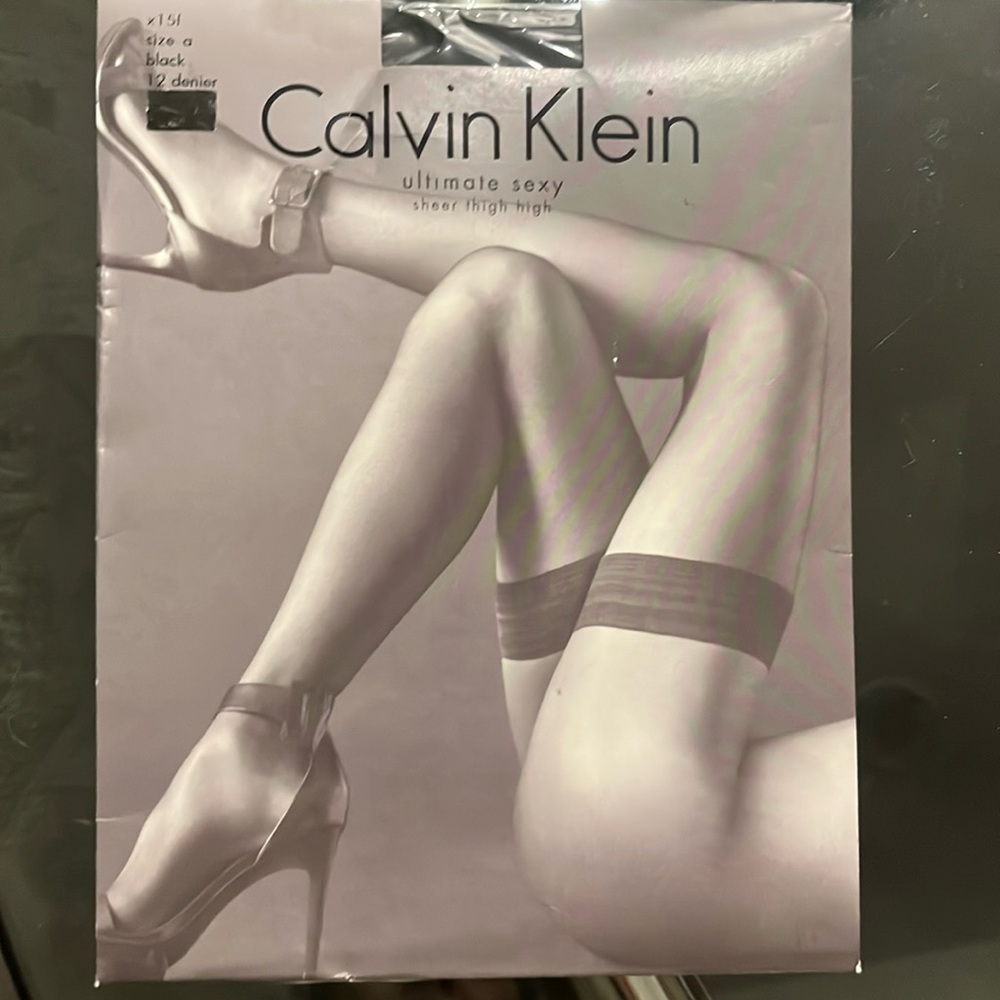 Black sheer Calvin Klein thigh high stockings new in packaging size A